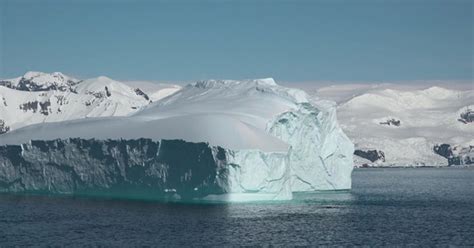 Nature of Antarctica. Icebergs from melting glacier. Climate Change and ...