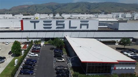 How does Tesla build its cars? We'll show you - CNET