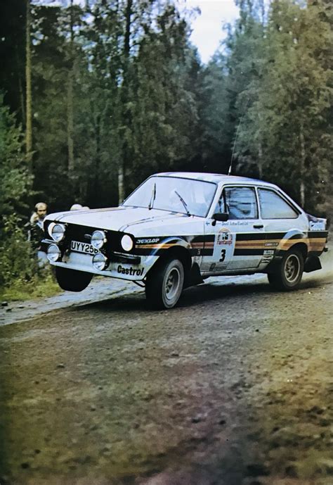 Vintage Ford Rally Car on Dirt Road