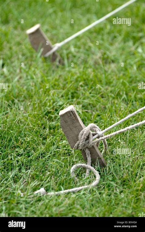 Wooden tent stakes hi-res stock photography and images - Alamy