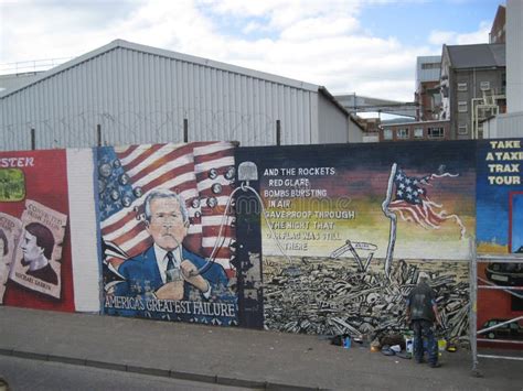 Peace Wall with Painted Murals in Belfast, Northern Ireland Editorial ...