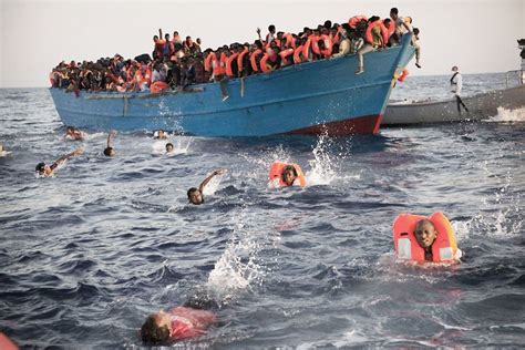 Thousands of refugees rescued from boats off coast of Libya | The Independent | The Independent