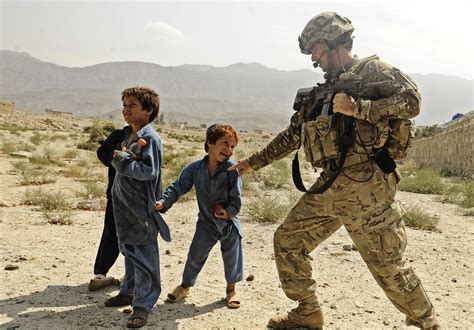 File:US Soldier plays with Afgan kid.jpg - Wikimedia Commons