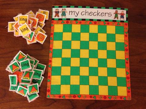 Checkers fabric game board and pieces