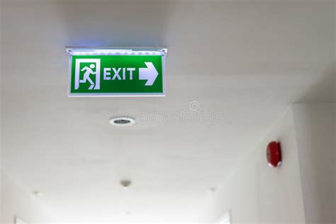 Signs of Green Emergency Exit Sign in Residential Building Stock Photo ...