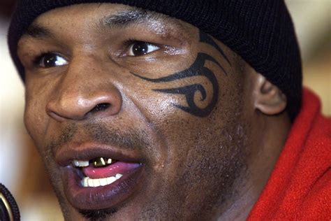 The story behind Mike Tyson's infamous face tattoo with heavyweight legend originally wanting ...