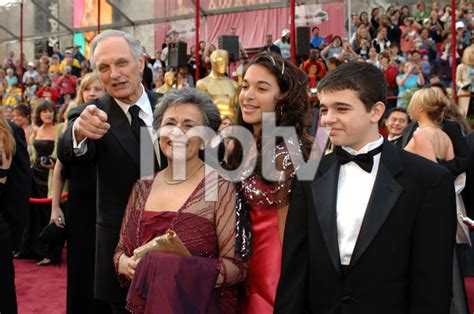 Academy Award Best Supporting Actor nominee Alan Alda arrives with his wife and two ...