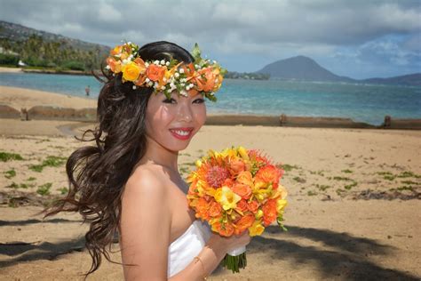 Hawaii Wedding Flowers: Orange Tropical Bouquet and Haku Lei