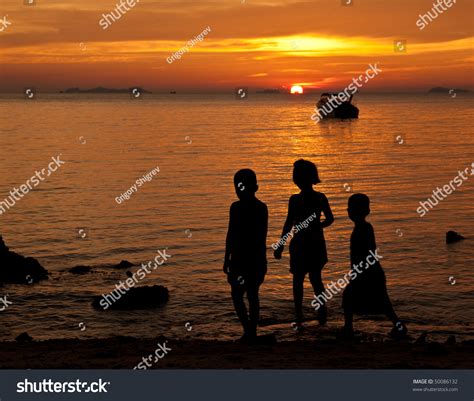 Silhouette Children Playing On Beach Sunset Stock Photo 50086132 | Shutterstock