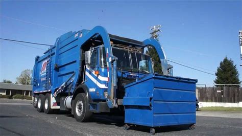 Garbage truck front loader - YouTube