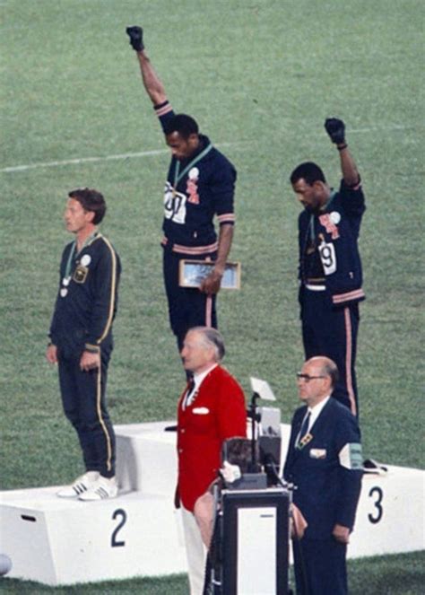 John Carlos and Tommie Smith raising their fist on the podium at the summer Olympics (1968 ...