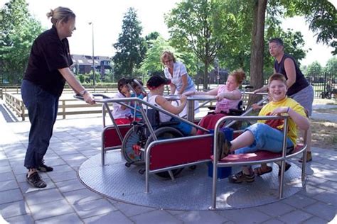 This is a type of merry-go-round that is accessible for children in wheelchairs. Students with ...