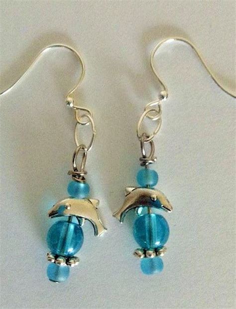 Dolphin Earrings | Dolphin earrings, Earrings, Jewelry