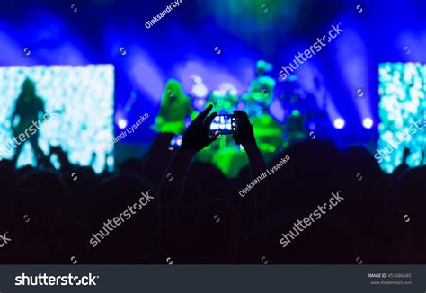 Crowd Of People At A Concert, Dark Silhouettes Stock Photo 457686685 : Shutterstock