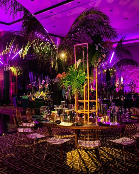 Epic Jungle Themed Party Inspiration from Engage19 Nizuc - Perfete | Tablescape with tall ...
