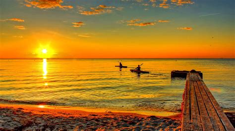 Beautiful Sunrise View Reflection On Water Pier Wood Dock Above Water ...