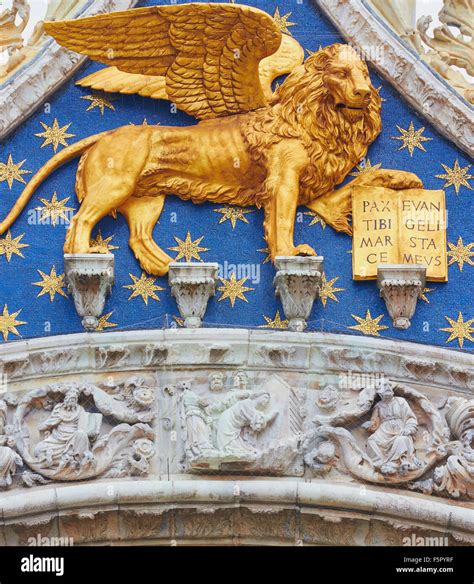 Winged lion the symbol of Venice on Basilica Di San Marco Veneto Italy Europe Stock Photo - Alamy