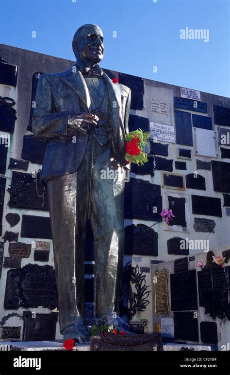 Carlos Gardel statue on his grave in La Chacarita cemetery. Buenos ...