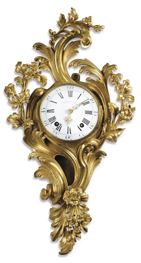 A LARGE LOUIS XV GILT-BRONZE CARTEL CLOCK, THE DIAL AND THE MOVEMENT SIGNED SILVESTRE / A PARIS ...