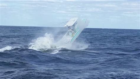 SMALL BOAT GETS BIG AIR AT JUPITER INLET!!! - YouTube