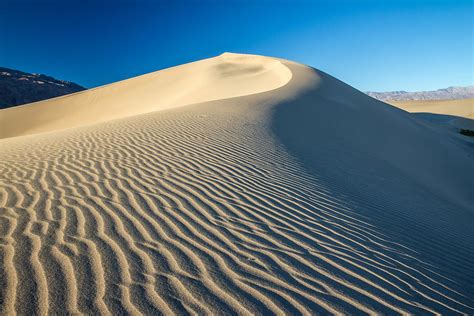 Sand dunes wind erosion Photograph by Pierre Leclerc Photography - Fine Art America