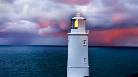 Trevose Head lighthouse under cloudy sky at sunrise, Cornwall, England, UK | Windows Spotlight ...