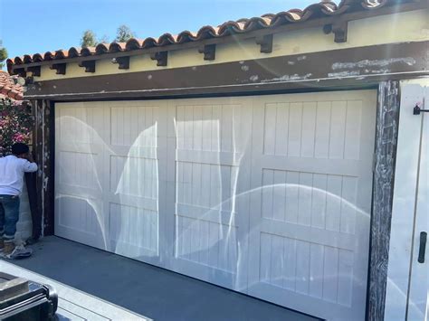 Garage Door Tracks and Roller Repair and Replacement: A Comprehensive ...