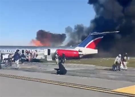 Airplane Catches Fire After Landing At The Miami International Airport ...