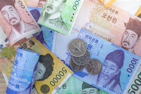 Premium Photo | Korean currency banknotes and coins Korean currency exchange rate