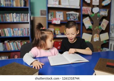 Children Library Reading Interesting Book Little Stock Photo 1261318744 | Shutterstock