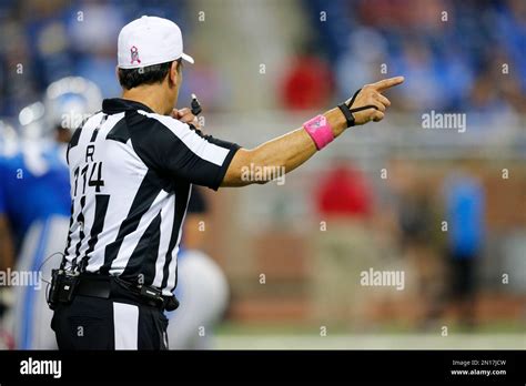 Referee Gene Steratore signals during the second half of an NFL football game between the ...