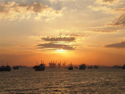 Cargo Ship and Cranes at Port Harbour in Tanjung Perak Surabaya with Sunset Sky Background Stock ...