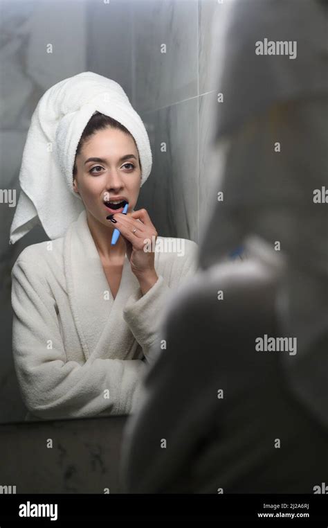 Young asian girl brushing teeth hi-res stock photography and images - Alamy