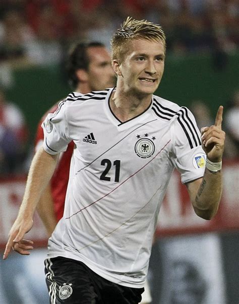 Germany’s Marco Reus celebrates after scoring a...