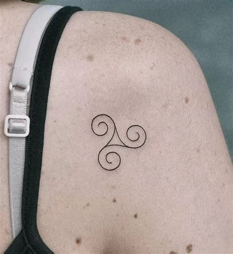 12 Triskelion Tattoo Designs with Meanings and Ideas - Body Art Guru