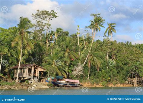 Boat and House on Riverbank Stock Photo - Image of scene, philippine ...