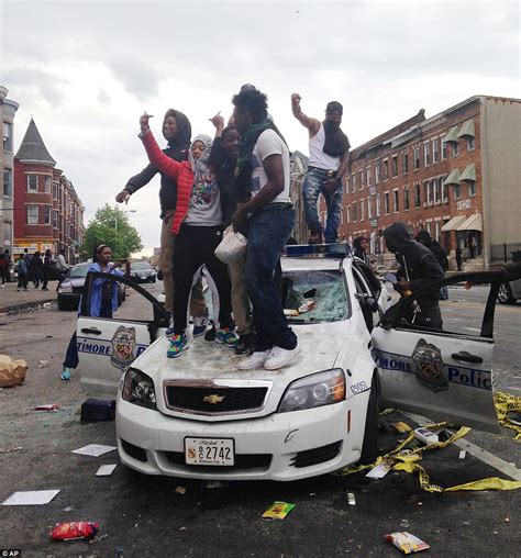 Huge blazes rip through Baltimore as Freddie Gray rioters torch buildings including a nursing ...