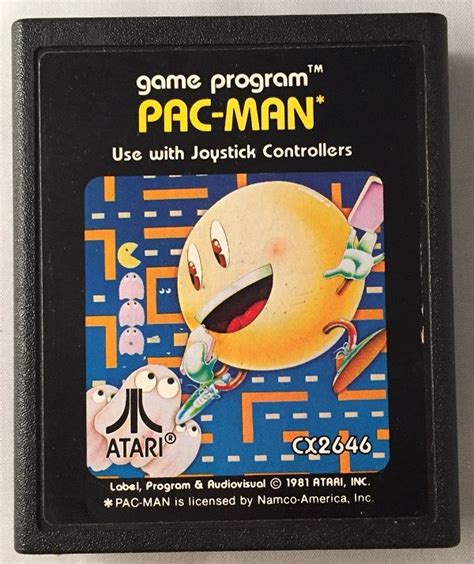 BIBLIO | 1981 Pac Man Atari 2600 Game Cartridge by (Atari) IWATANI, Toru | | | Atari