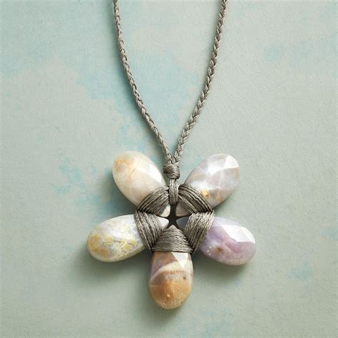 PETAL PERFECT NECKLACE -- Faceted Brazilian agate is tied into a five-petal flower on a necklace ...