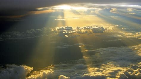 Sun Rays Through Clouds Wallpaper