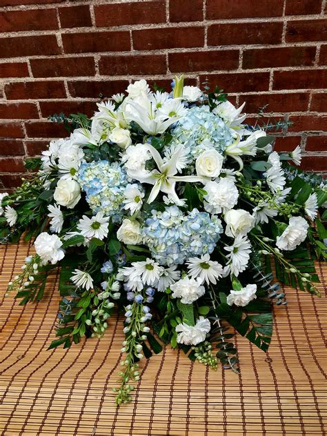 Eckert Florist's Blue and White Casket Spray in Belleville, IL | Eckert Florist