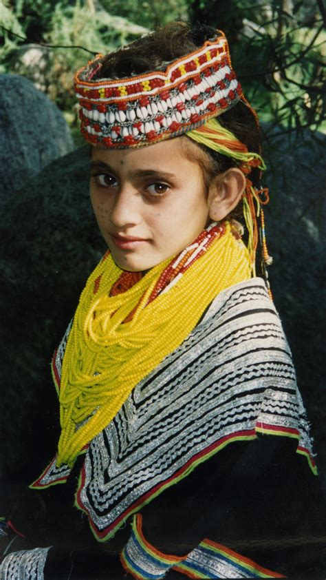 Asia: Young polytheistic girl of Kafiristan in her traditional garb ...