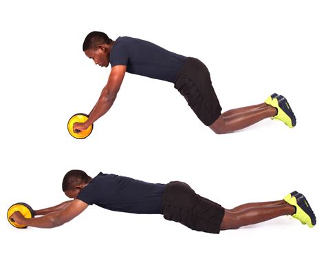 Man Demonstrates How to Do Ab Wheel Roller Exercise While Kneeling ...