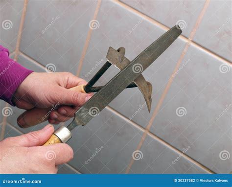 Small hoe sharpening stock photo. Image of close, file - 30237582