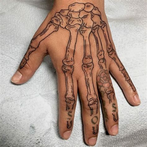 101 Latest Skeleton Hand Tattoos For 2024!