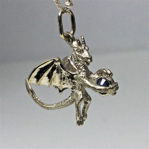 White Gold Sapphire Dragon Pendant In 14PD Gold - Postgate Celtic ...