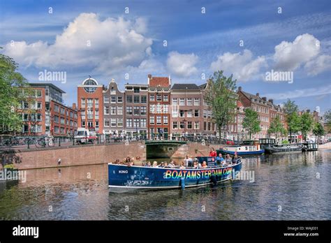 Sunny day in the historic Amsterdam Canal Belt. In august 2010 the Amsterdam Canal belt was ...