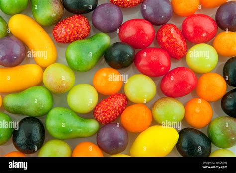 Many colorful candy sweets in fruit shape Stock Photo - Alamy