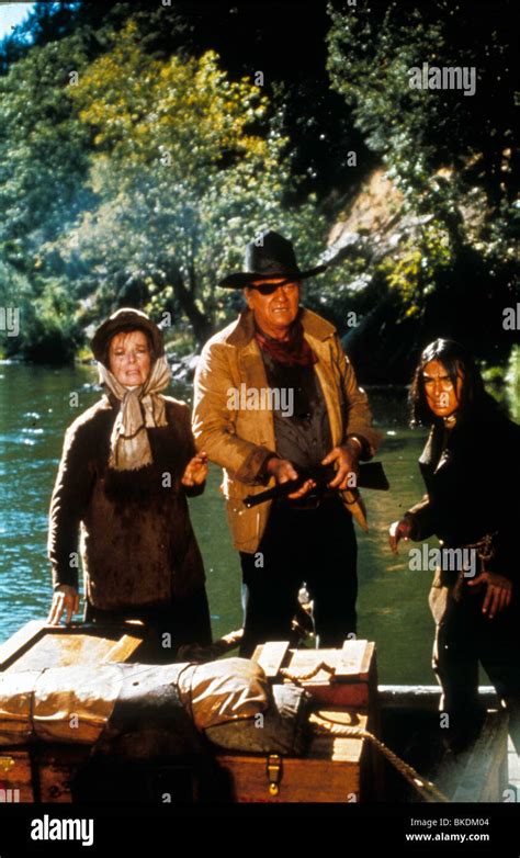 ROOSTER COGBURN (1975) KATHARINE HEPBURN, JOHN WAYNE, RICHARD ROMANCITO RCG 007 Stock Photo - Alamy