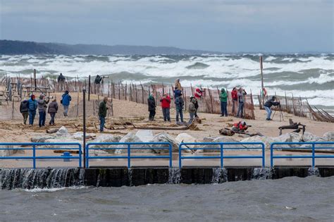 Lake Michigan waves exceeding 10 feet tall bash shoreline during storm - mlive.com